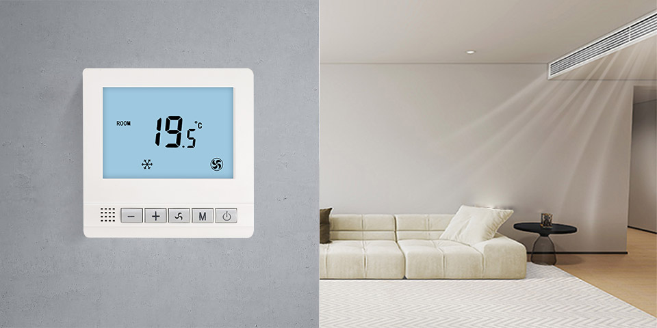 Digital display of FT06 thermostat showing FCU cooling and heating status